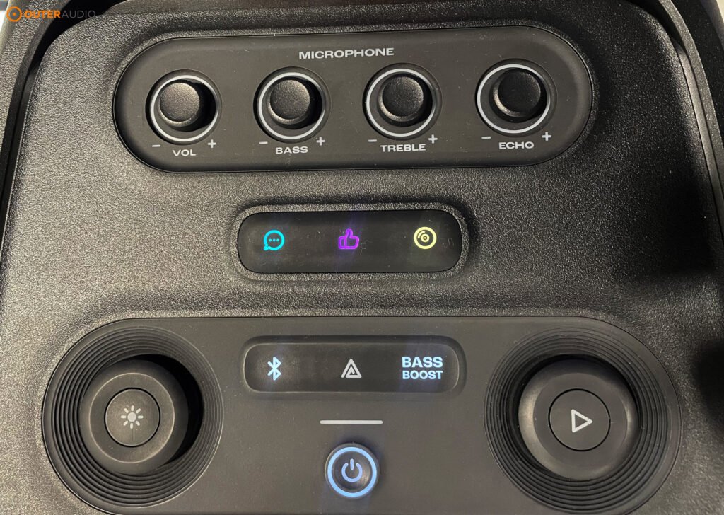 Top of the PartyBox 320, showing the 4 microphone buttons, the three effects buttons and playback controls.