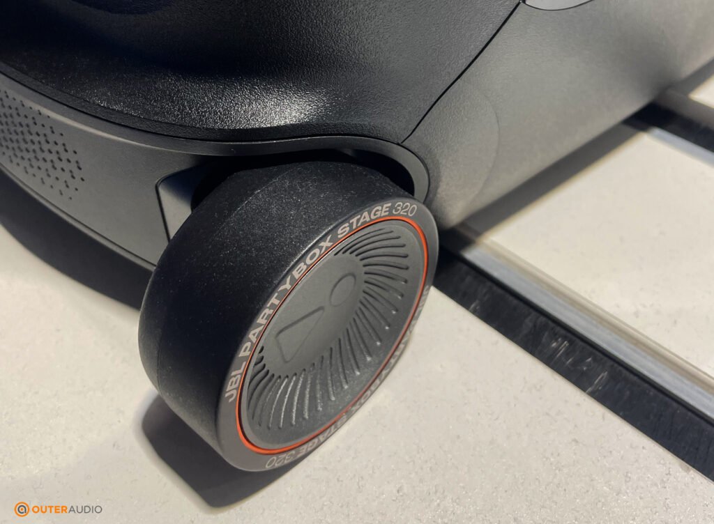 Top down view of the thicker wheels on the PartyBox 320.