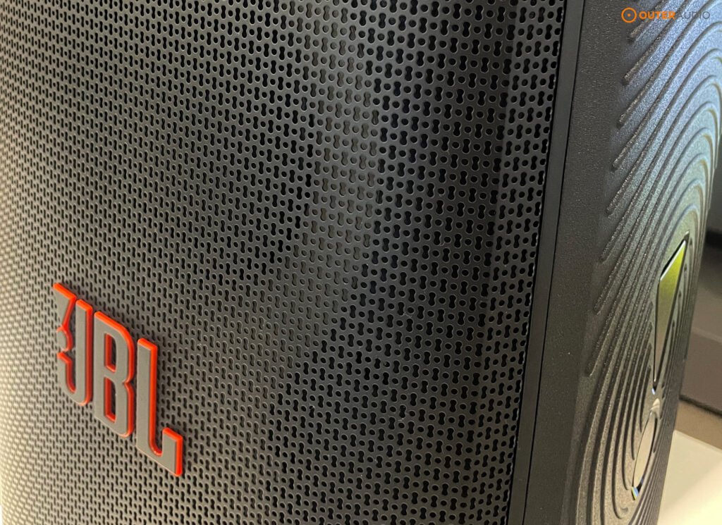 Close up of the front grille and JBL logo of the PartyBox 320