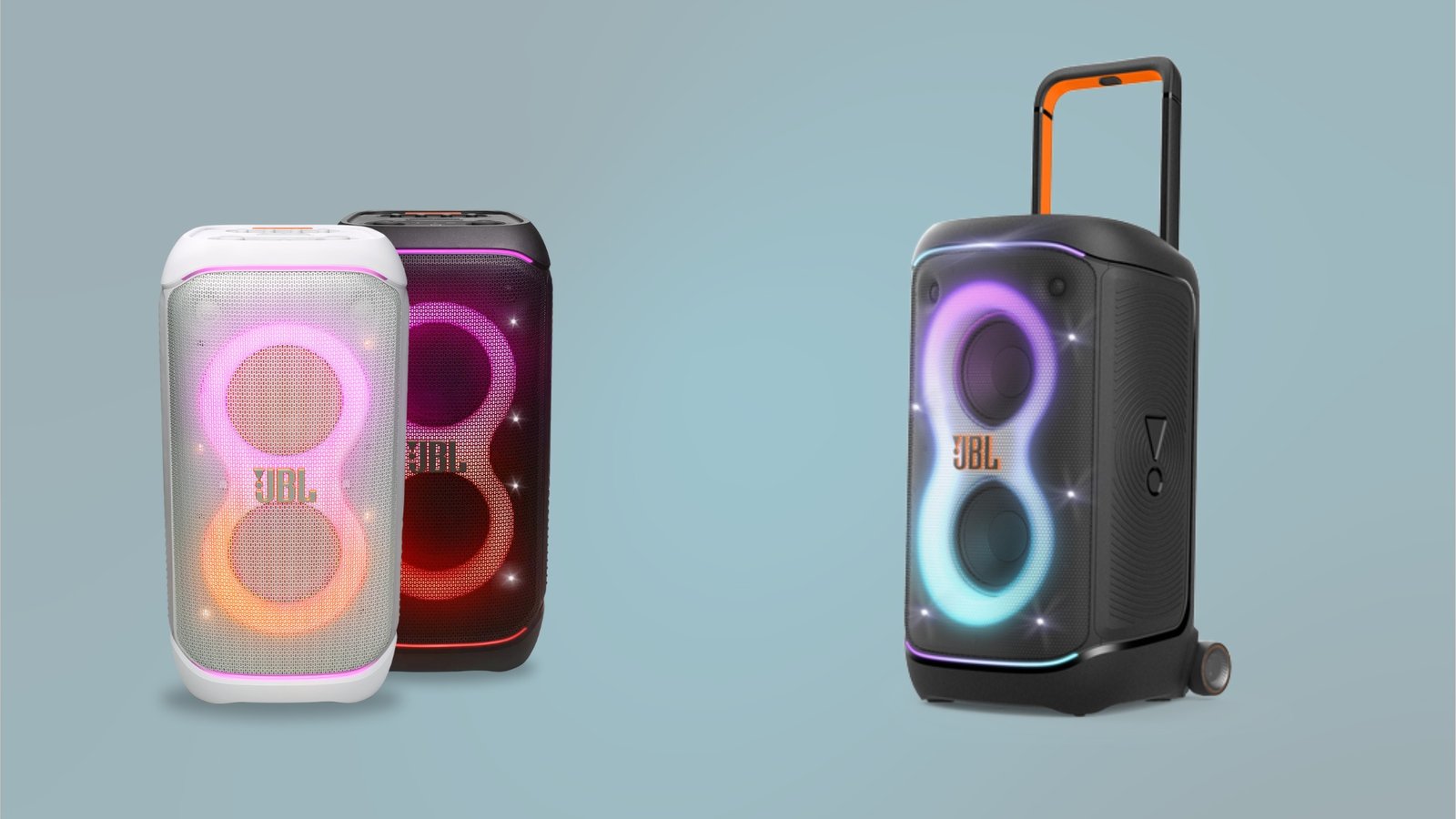 JBL PartyBox 320 (white and black models) on the left, JBL PartyBox 520 on the right, all speakers showing their lights