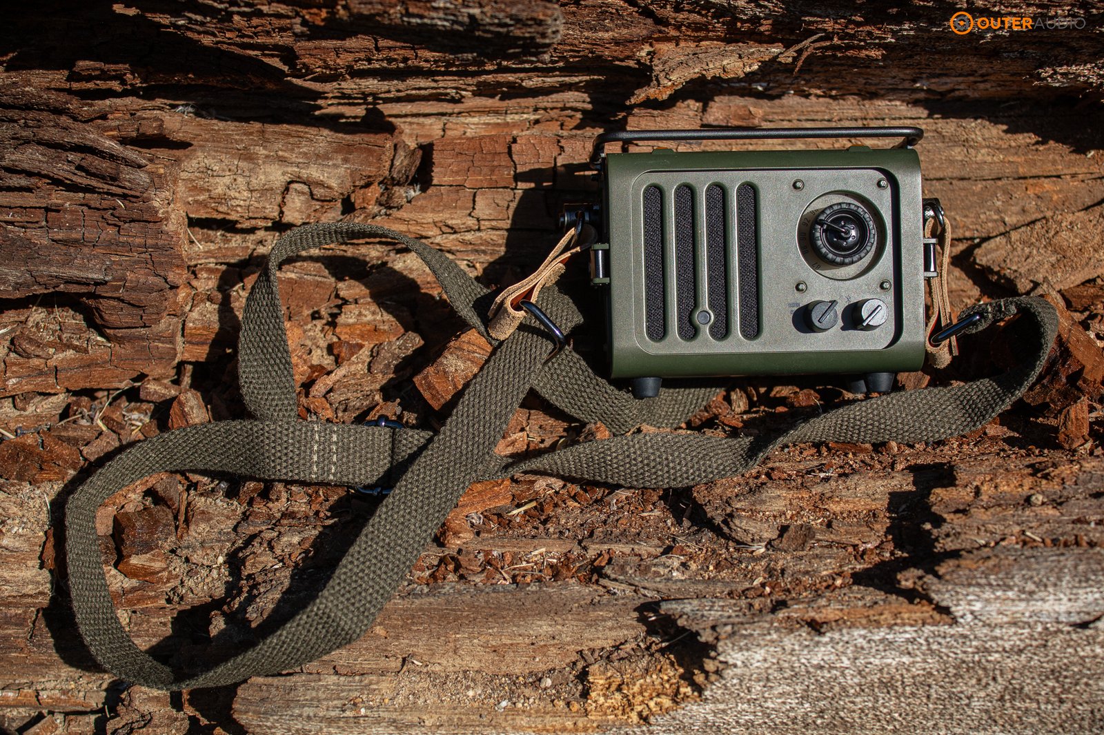 Muzen Wild Radio on tree trunk