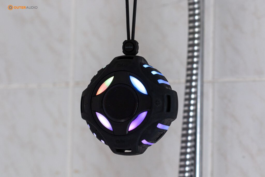 Comiso shower speaker hanging from shower head