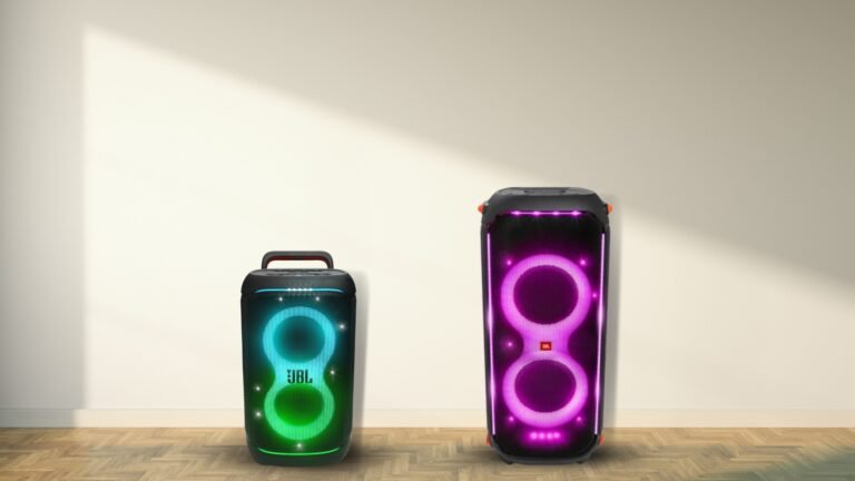 JBL PartyBox 520 next to the PartyBox 710 with lights on
