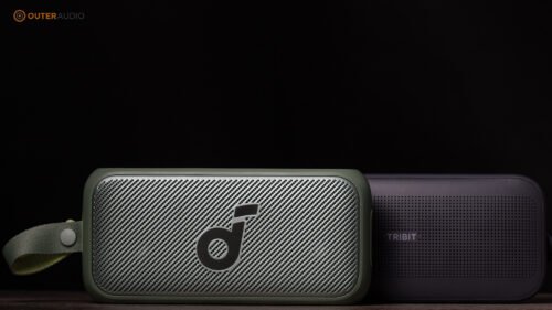 Soundcore Motion 300 next to the Tribit Stormbox Flow with a black background