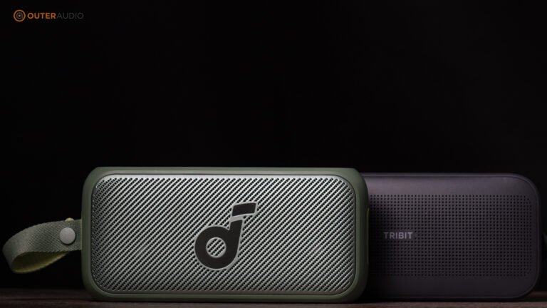 Soundcore Motion 300 next to the Tribit Stormbox Flow with a black background