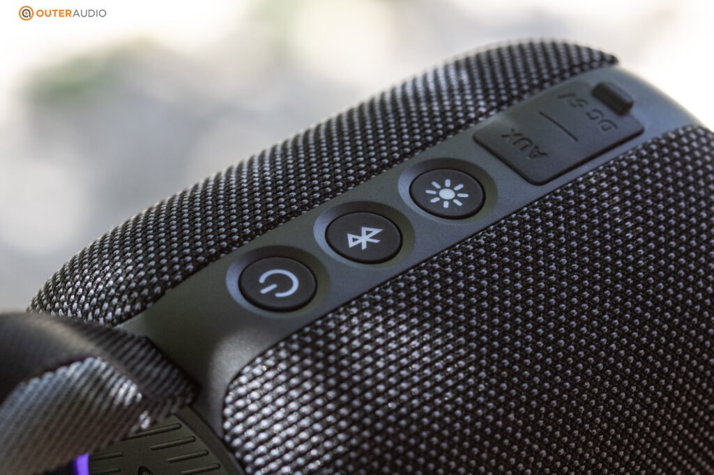 Buttons on the back of the Stormbox Mini Plus, showing power button, pairing and light toggle